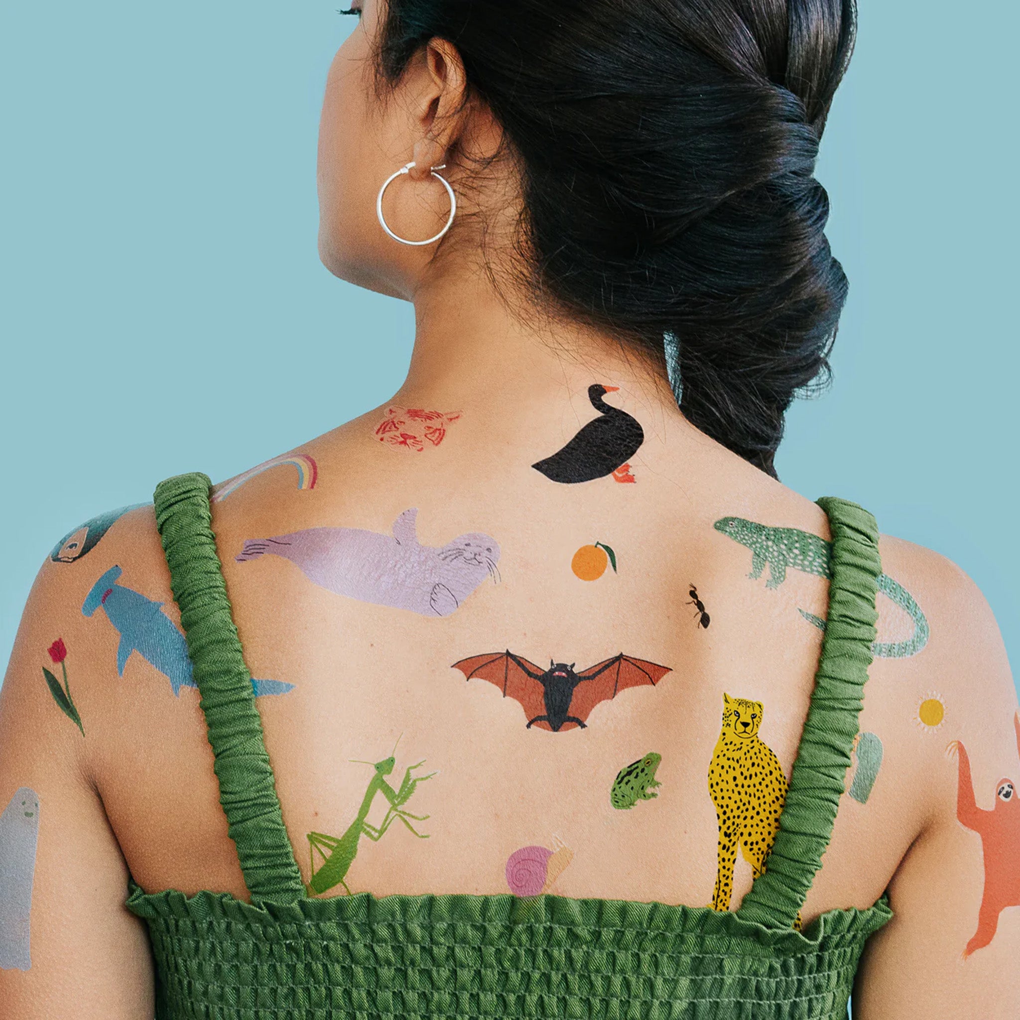 tattly_lorien-stern_jumbo-party-pack-variety-of-animals-on-a-persons-back
