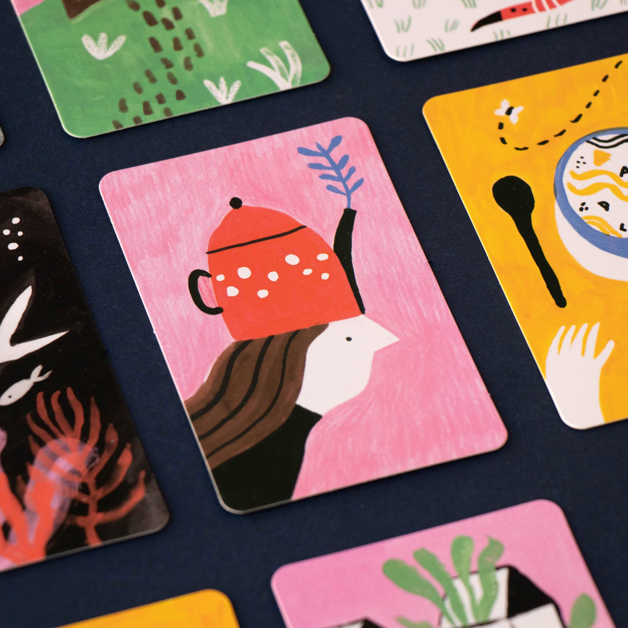 the-art-of-creating-stories-game-card-with-girl-wearing-teapot-for-a-hat