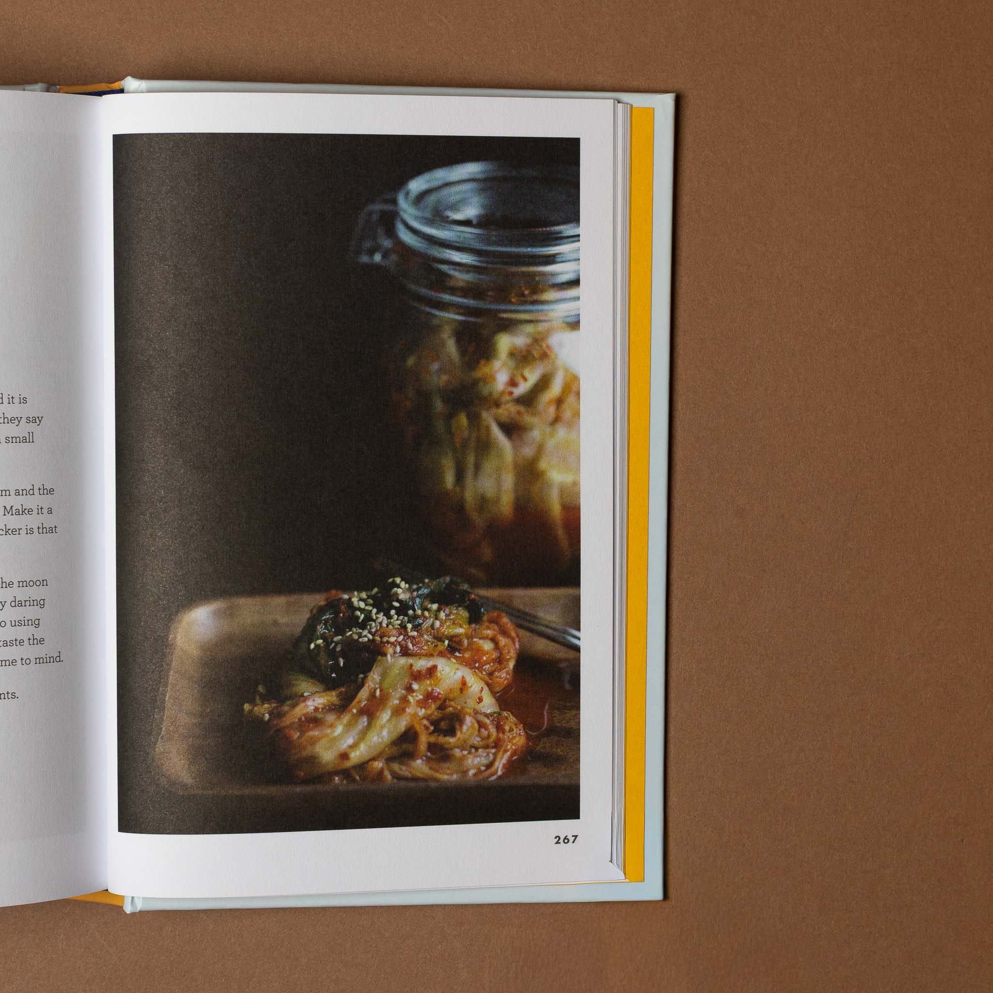 the-art-of-making-memories Open book showing a page with images of food on a brown background