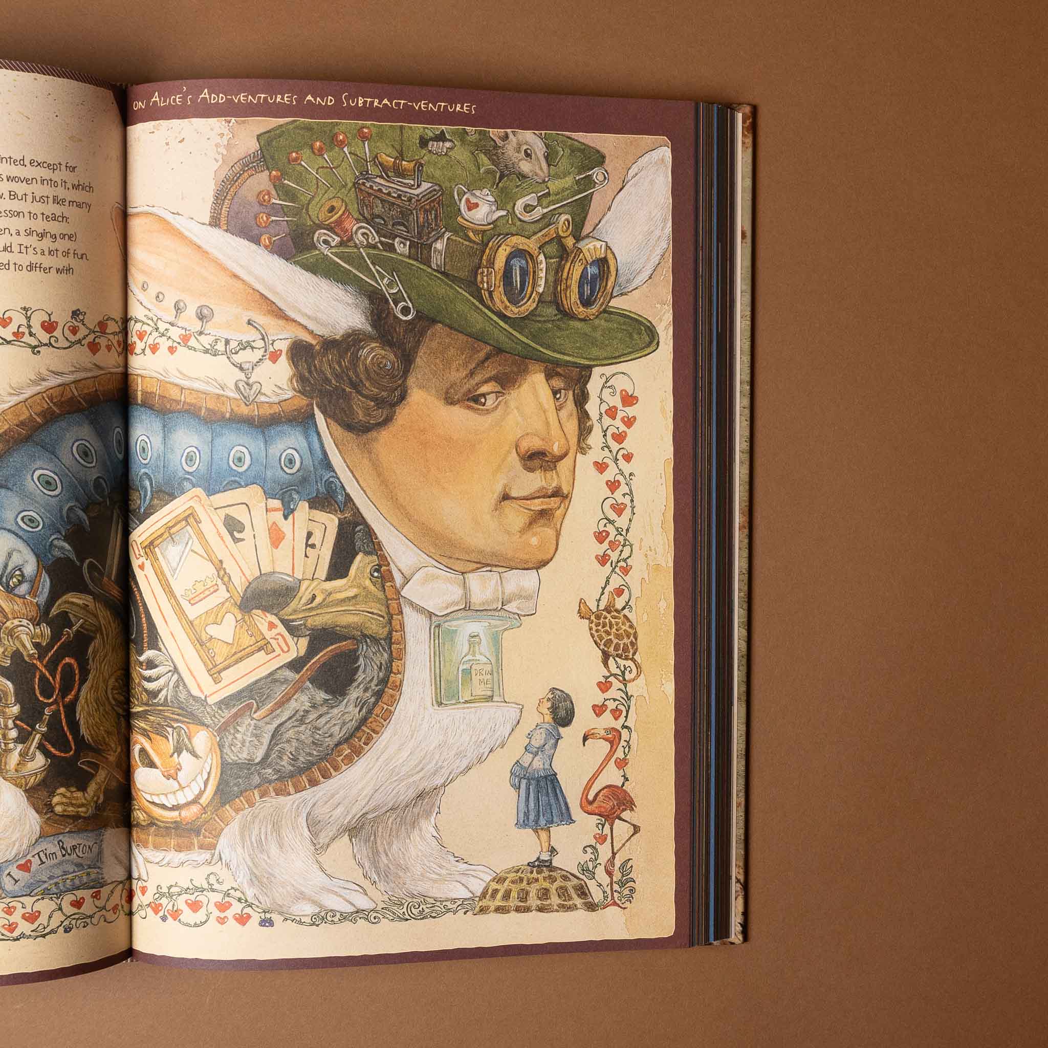 the-last-book-diary-of-the-last-earthling Illustrated book open to a page with detailed artwork on a brown background