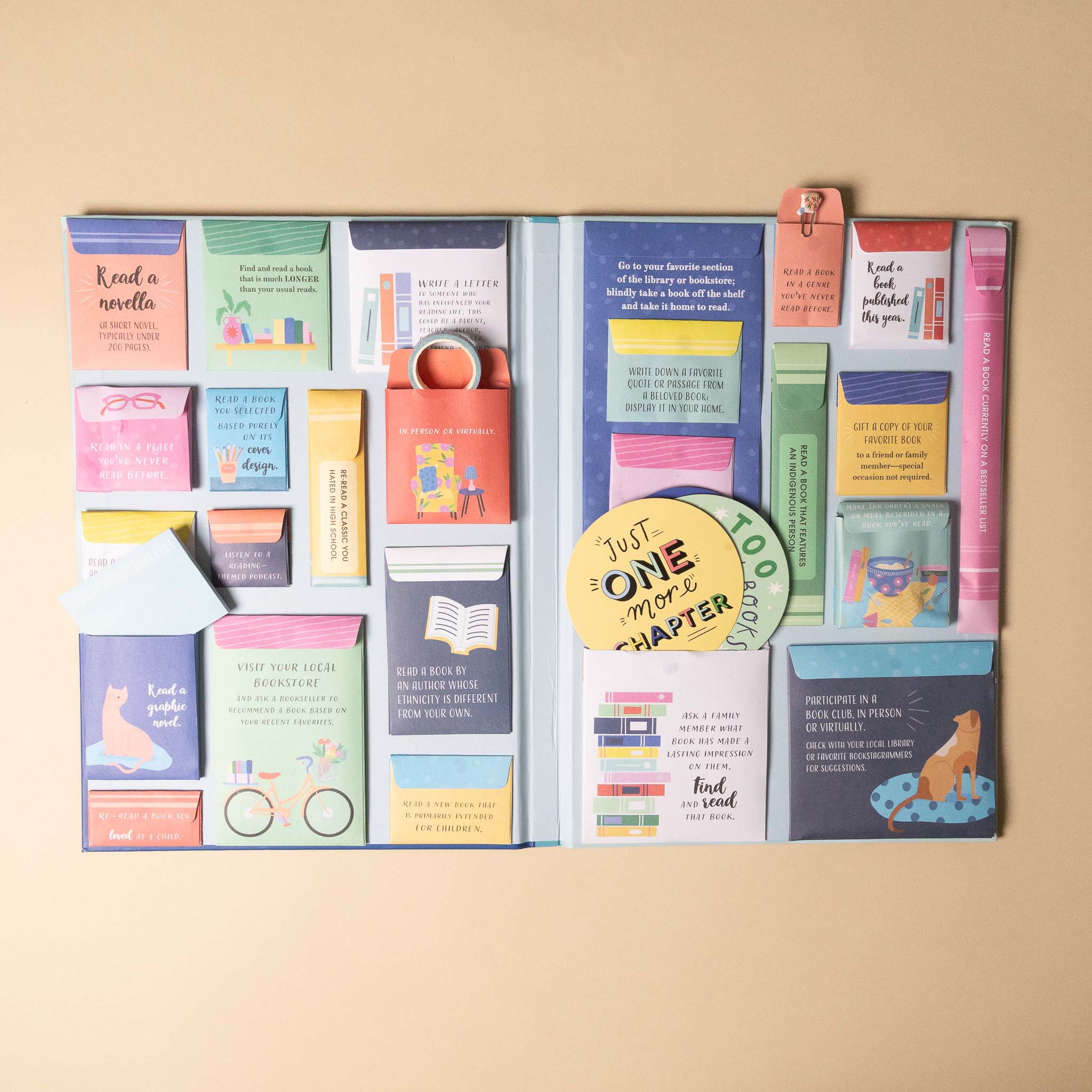 the-ultimate-reading-challenge-book Set of colorful book-themed pockets with notes on a beige background