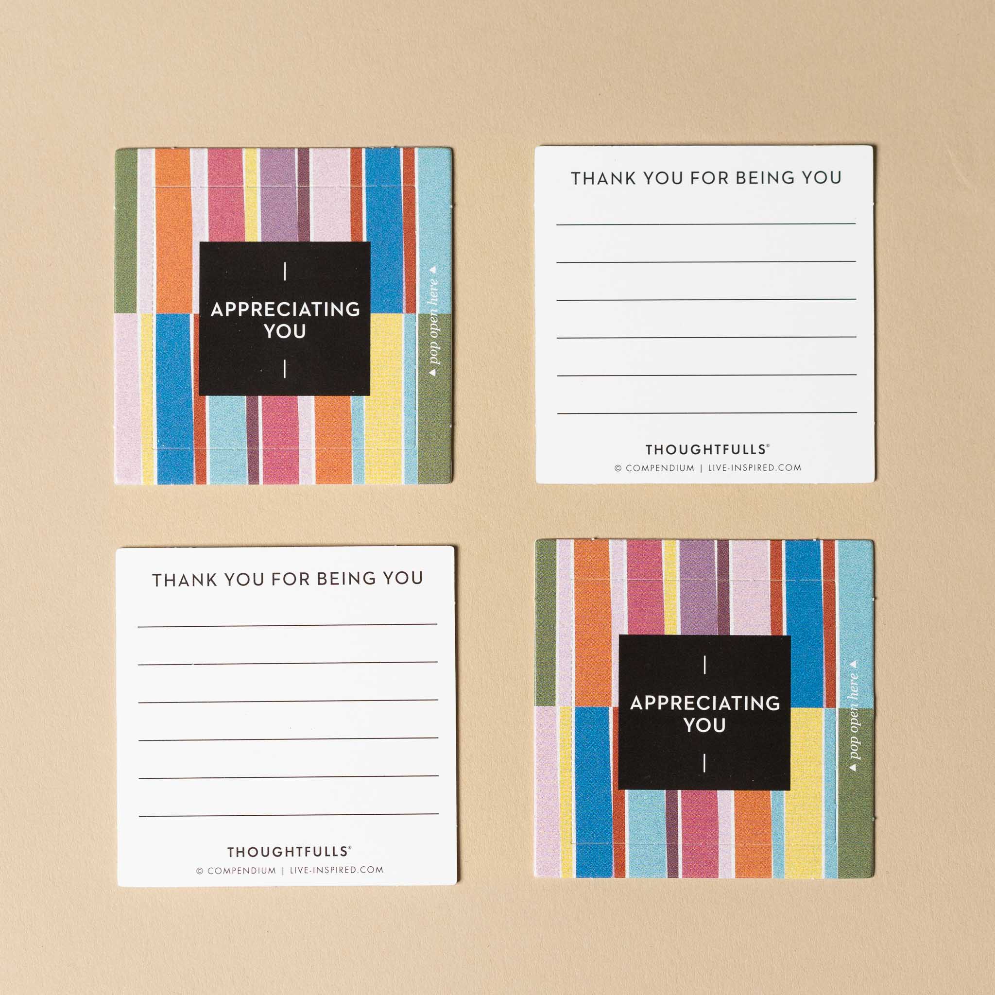thoughtfulls-pop-open-cards-appreciating-you Four cards with colorful striped designs and text on a beige background