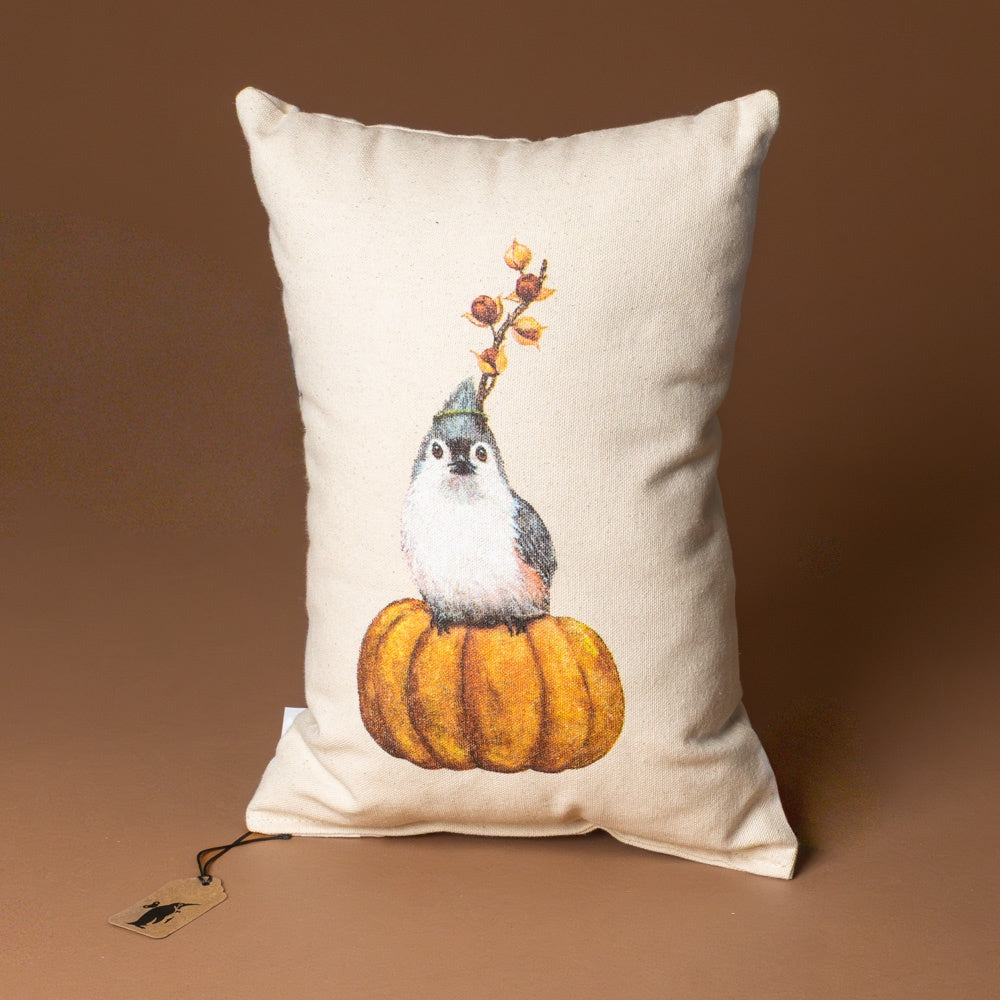 tufted-titmouse-pillow Decorative pillow with a bird and pumpkin design on a brown background
