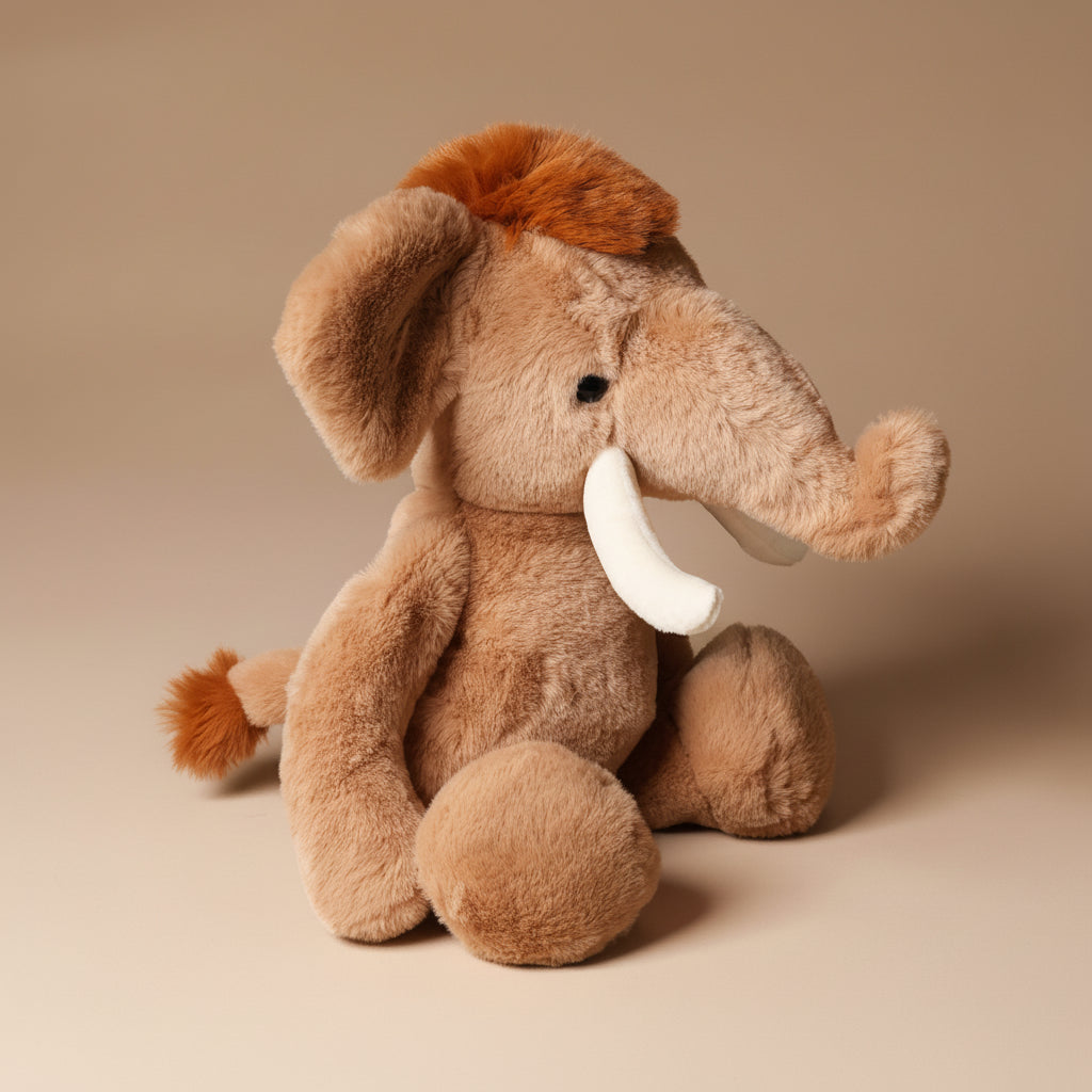 Plush wally-the-mammoth toy on a beige background