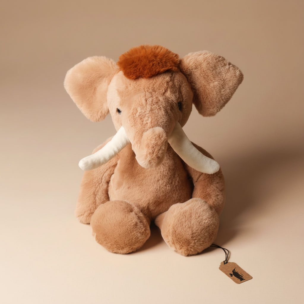 Plush wally-the-mammoth toy on a beige background