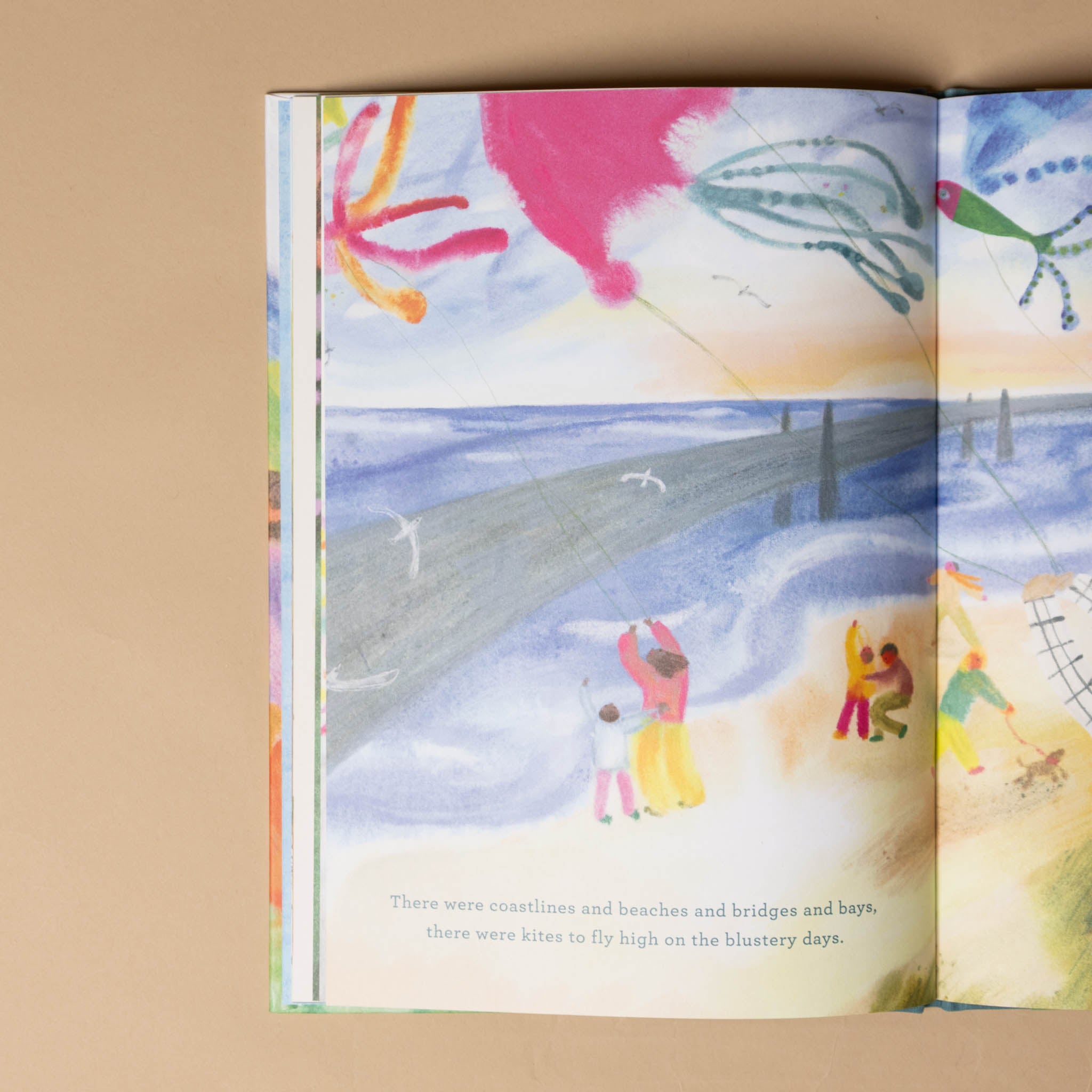 we-needed-a-you-book-text-and-illustration-of-people-flying-akite-on-a-beach