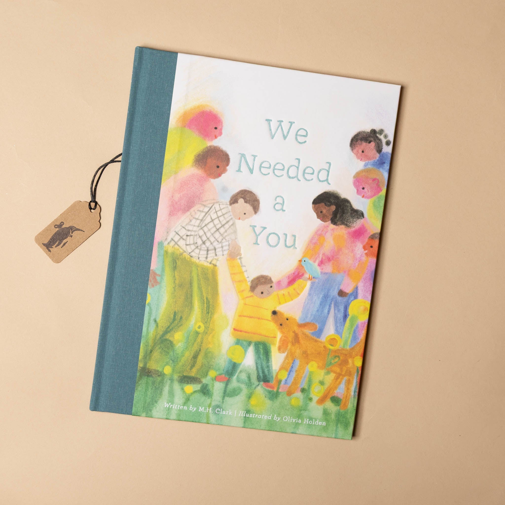 we-needed-a-you-book-with-family-holding-a-little-ones-hands
