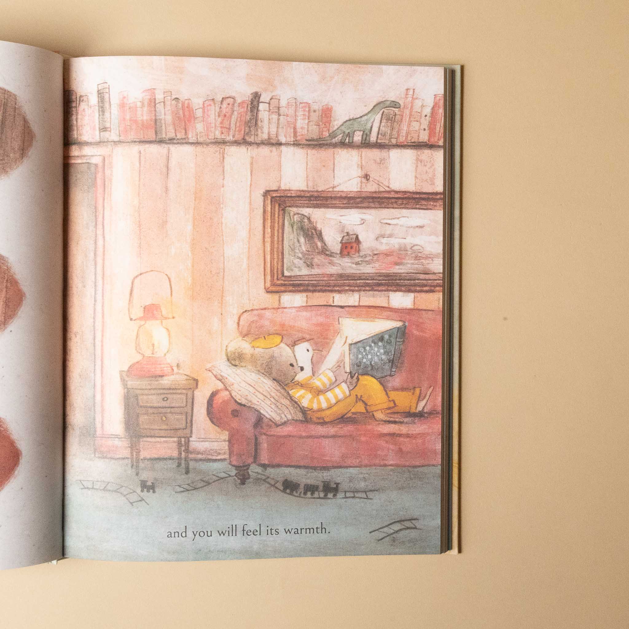 wherever-you-go-my-love-will-follow Illustration of a bear reading a book on a couch with a warm ambiance.