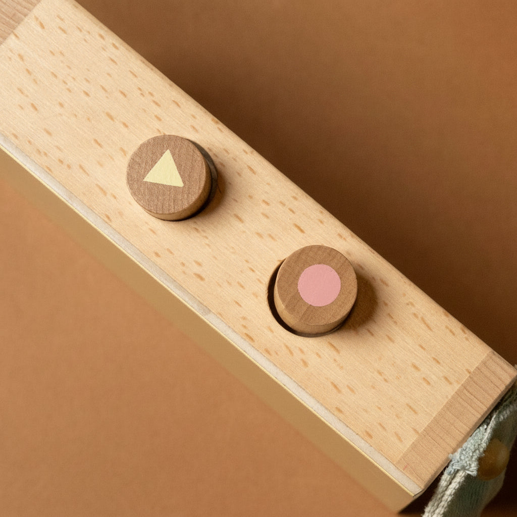 wooden-tape-recorder-with-purple-faceplate-buttons-for-play-and-stop