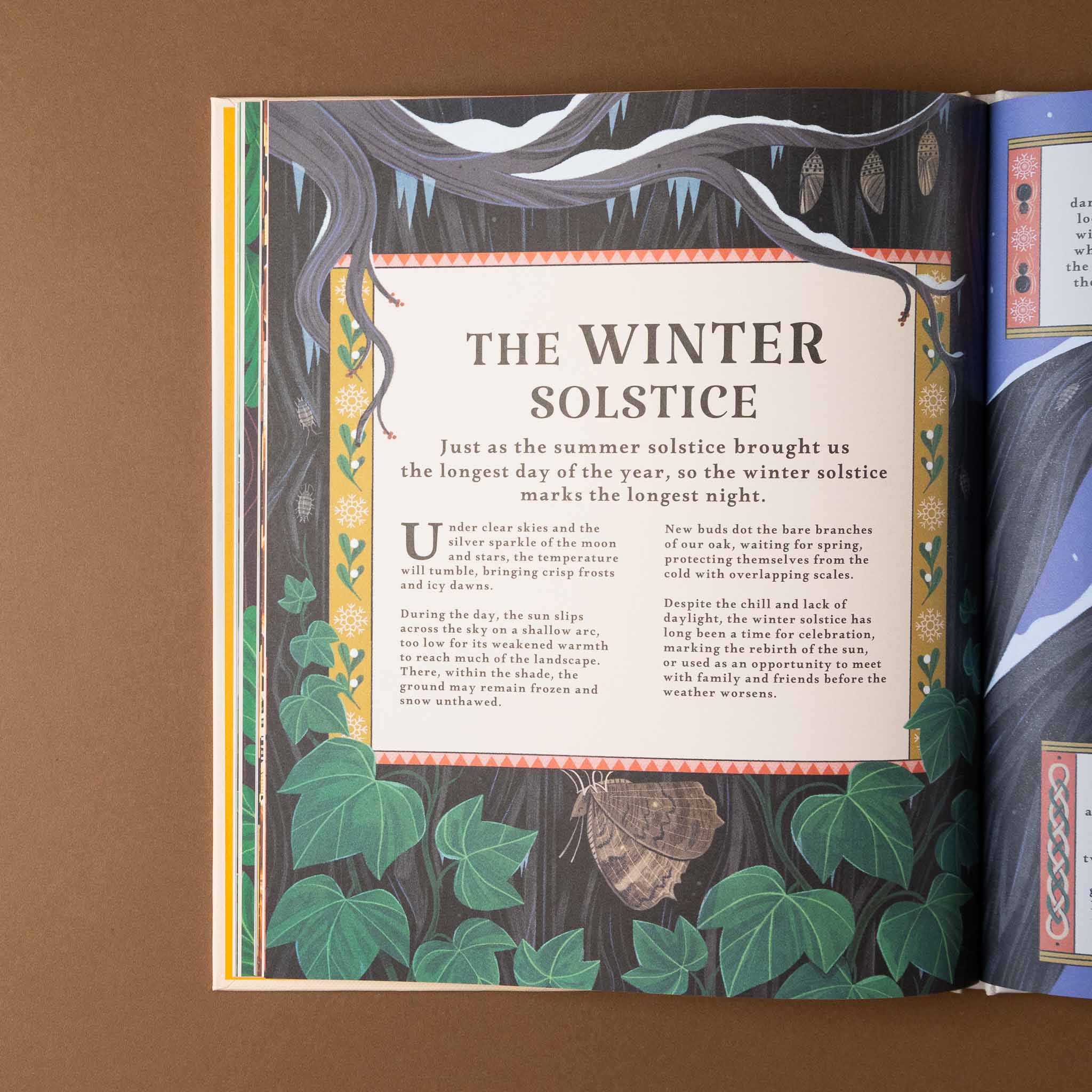 woodlore Book open to a page about the winter solstice with illustrations and text on a brown background