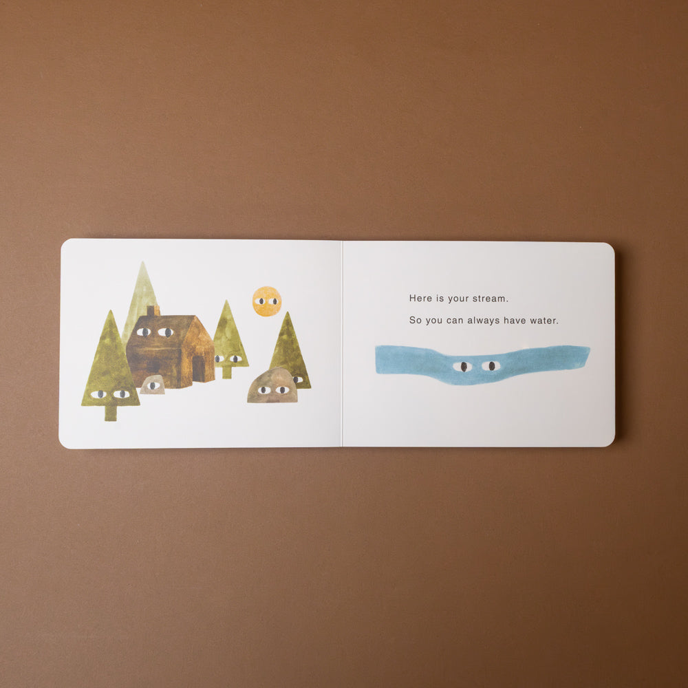your-forest-board-book Illustrated book page with a stream, trees, and a house on a brown background