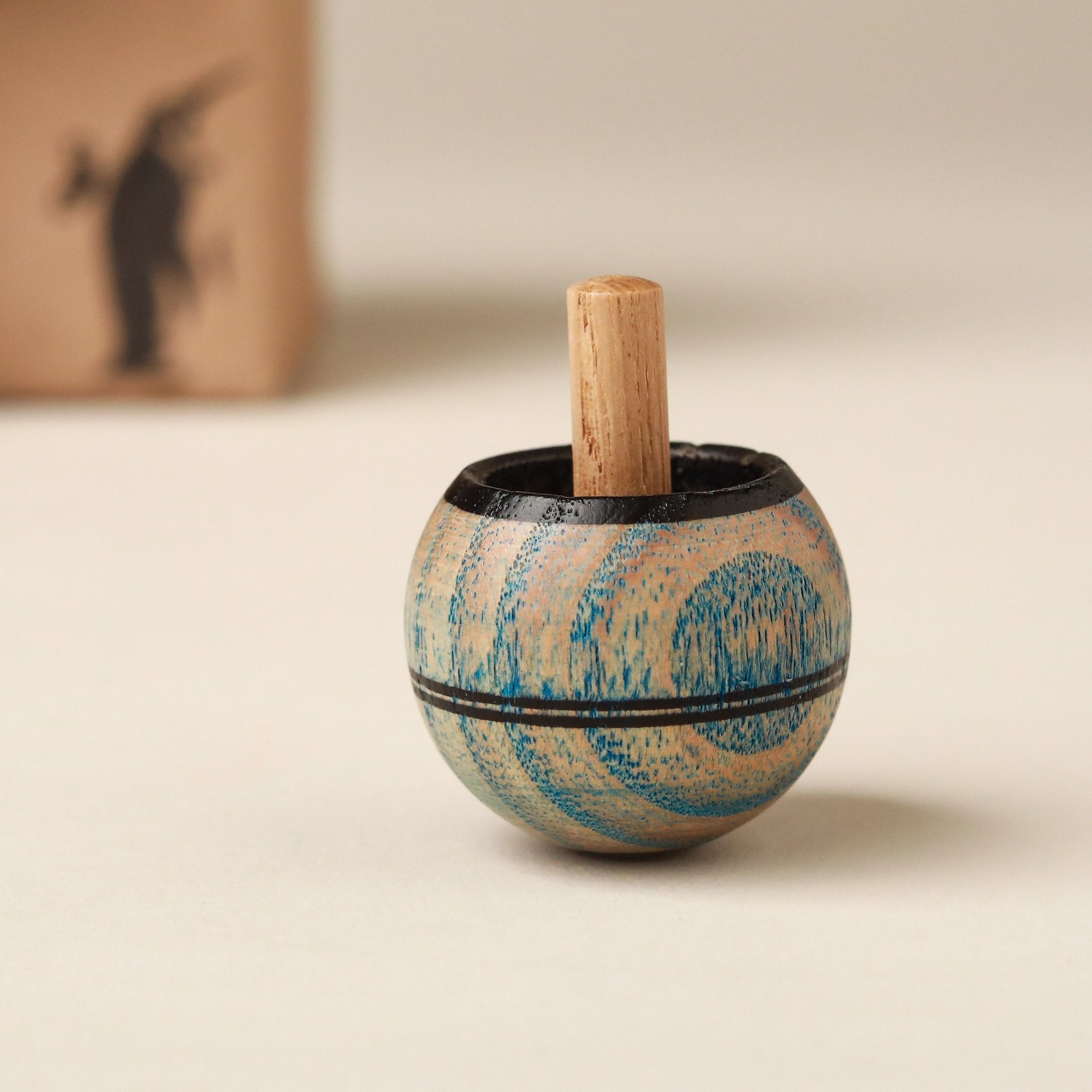 light-blue-color-washed-spinning-top