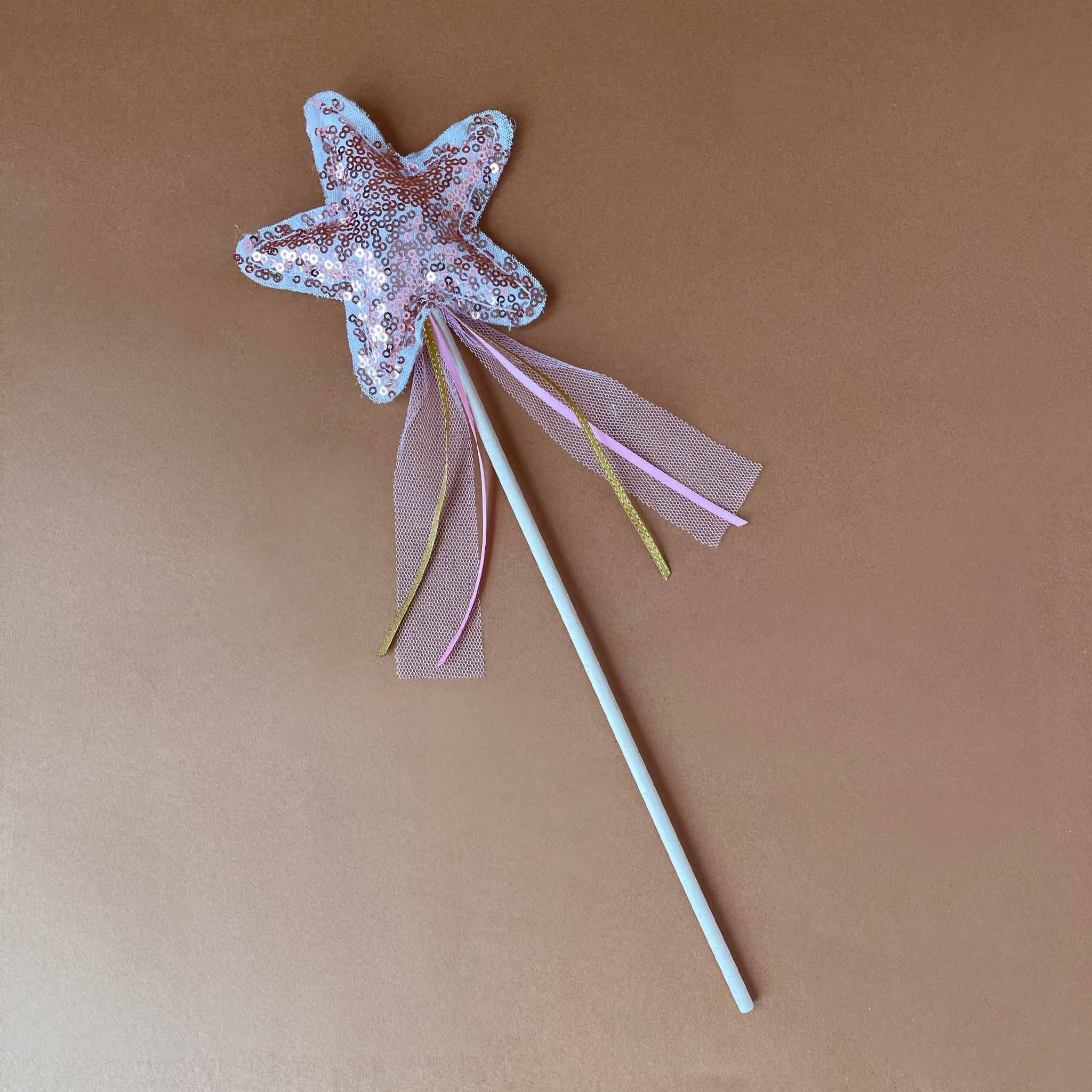 sequined-cloth-star-on-wooden-rod-with-tulle-and-ribbon