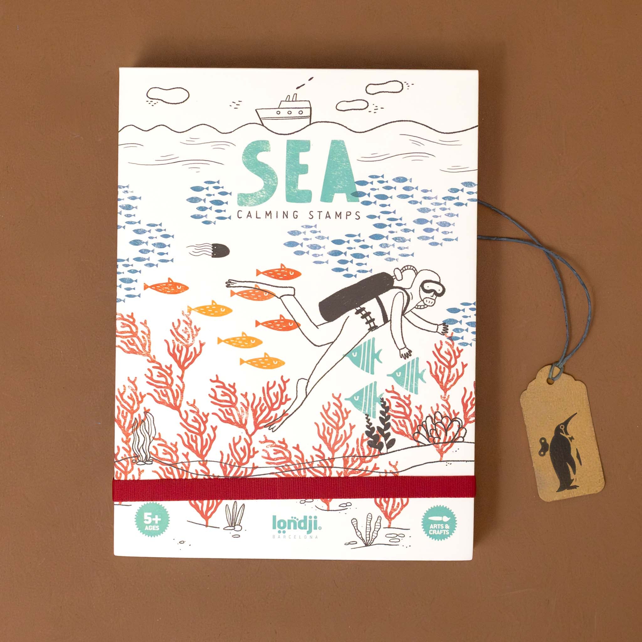 calm-stamps-under-the-sea-box-with-fish-and-coral-under-a-boat