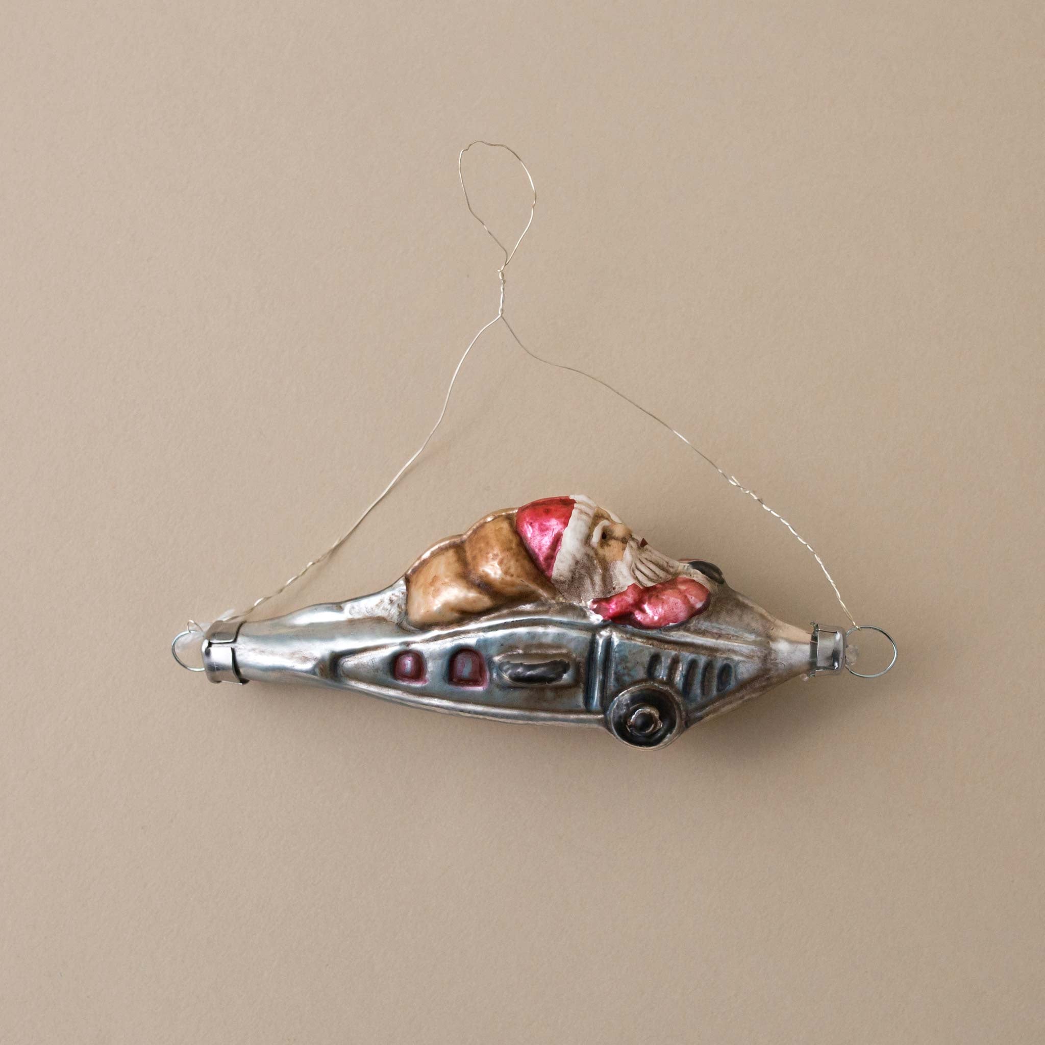 german-glass-ornamnet-santa-riding-in-silver-plane