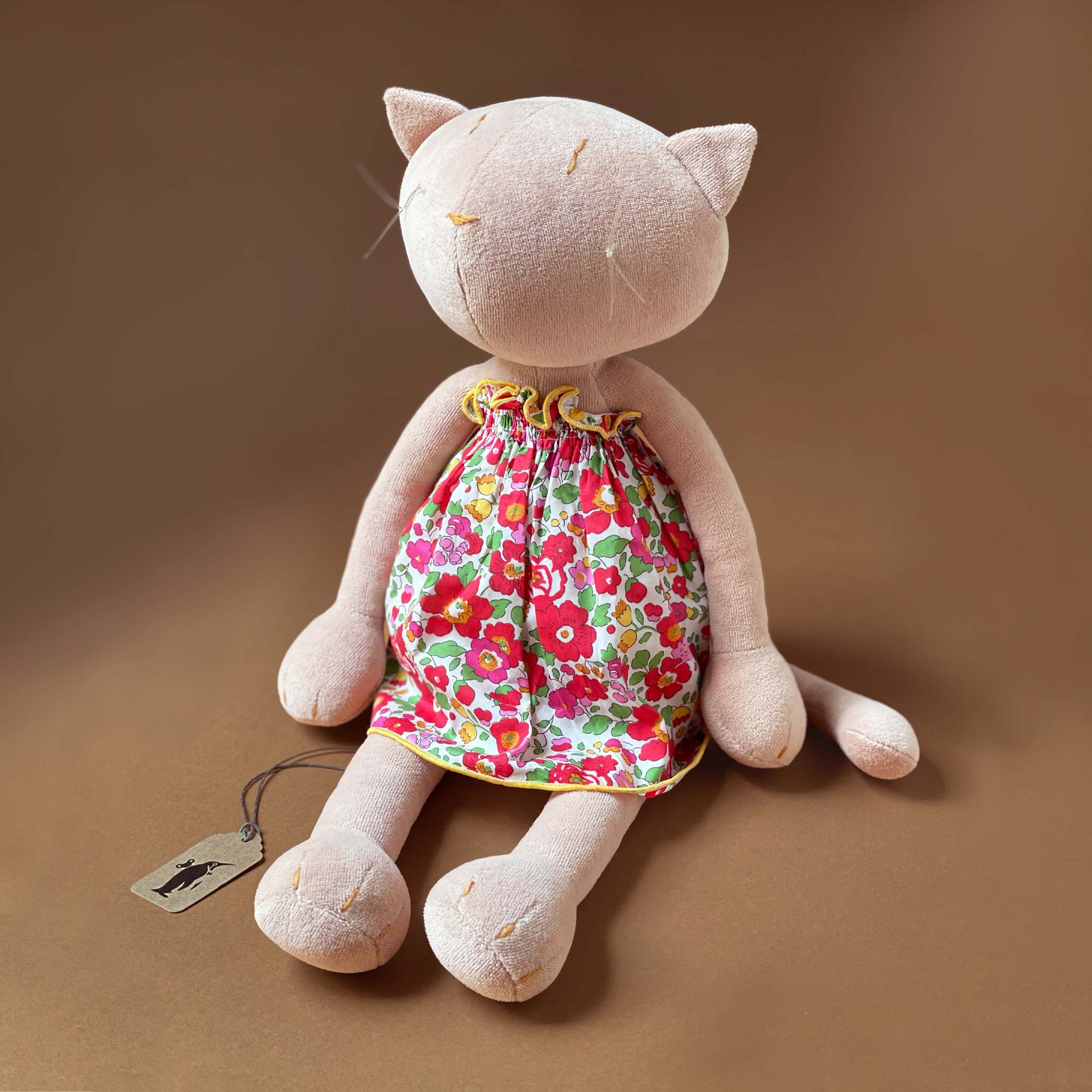 pink-cat-in-red-and-pink-floral-dress