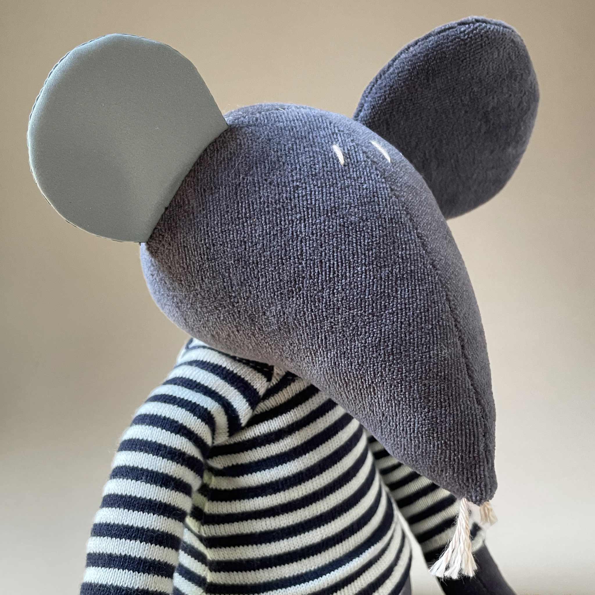 detail-of-stitched-eyes-and-big-ears