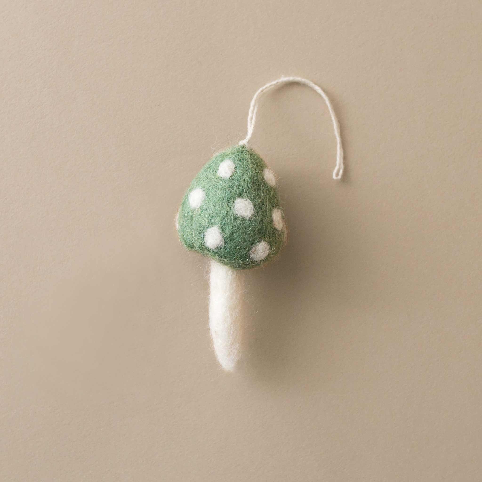 little-felted-mushroom-ornamnet-with-aqua-cap