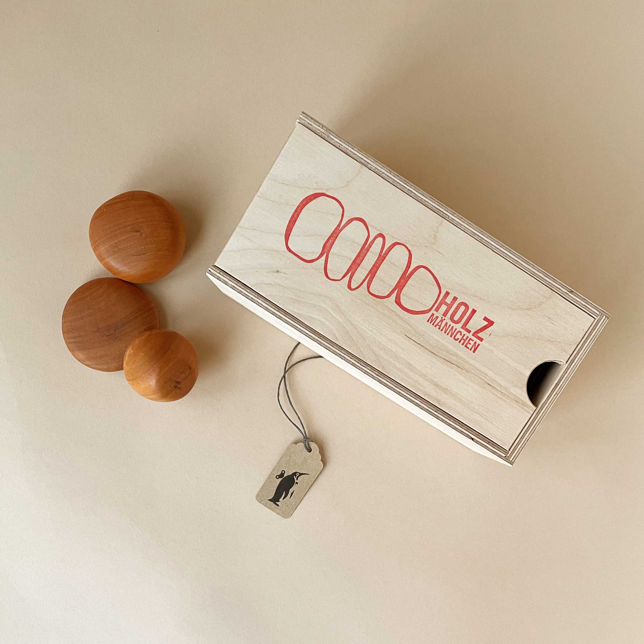 little-woodman-stackign-game-round-wood-stones-in-wooden-box