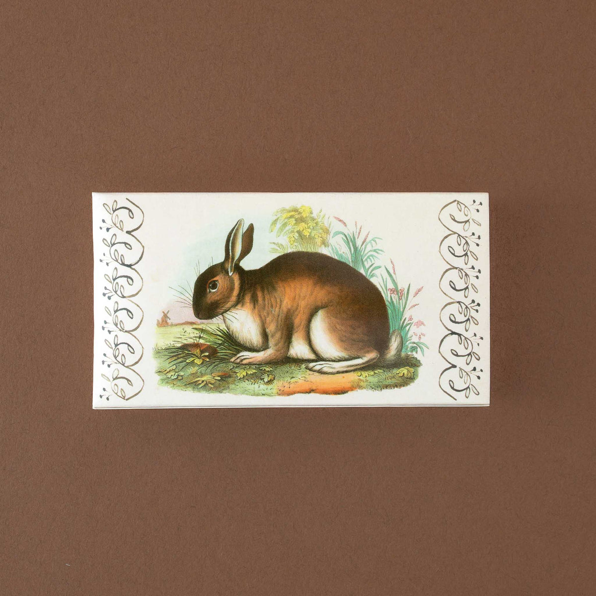 backside-of-matches-box-with-brown-rabbit-on-beige-background