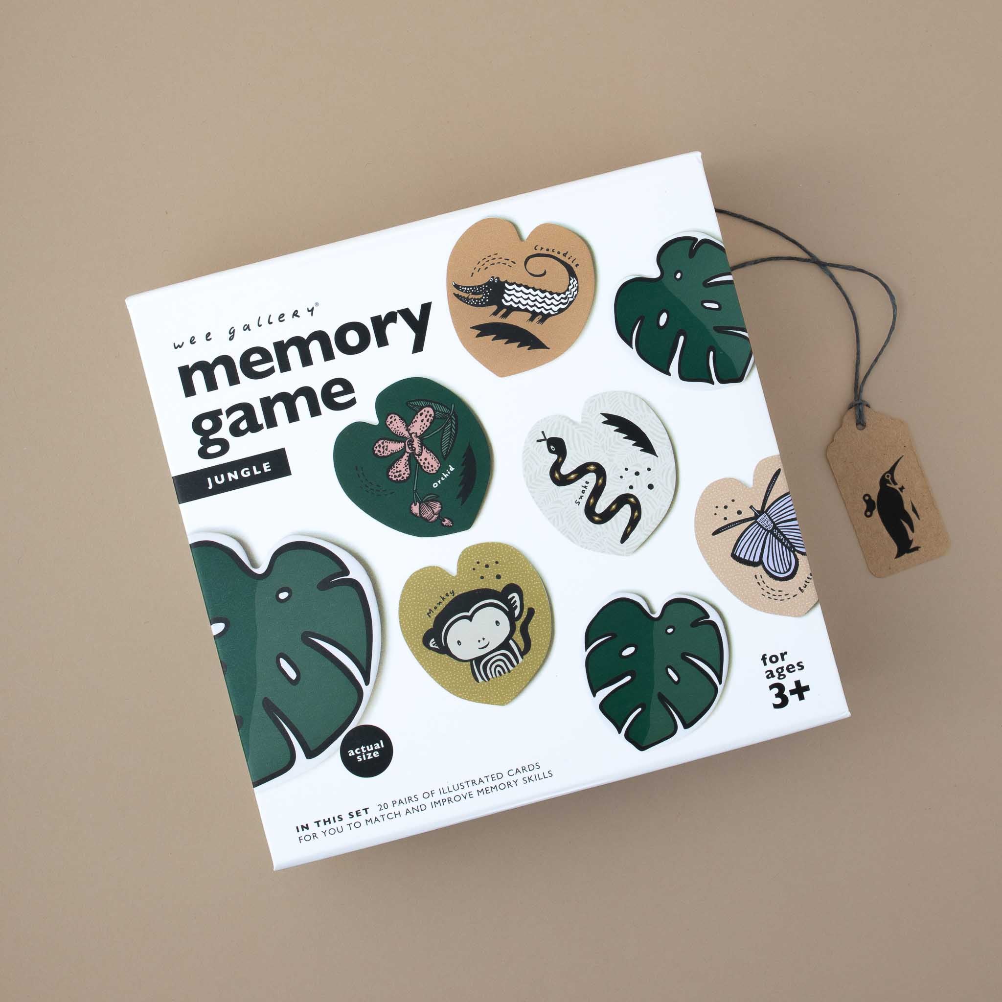white-box-with-small-monstera-leafs-and-animals