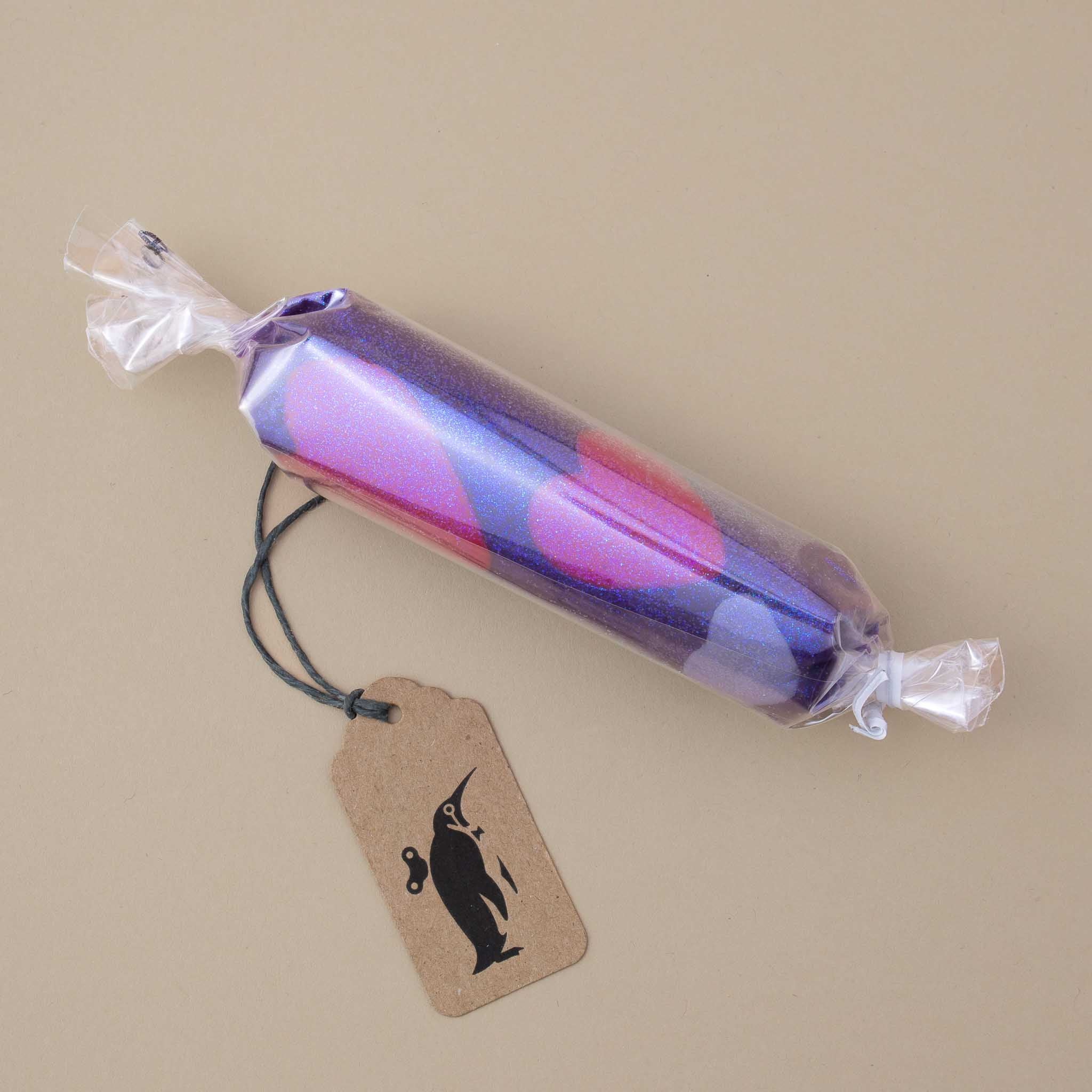 roll-of-play-dough-in-purple-with-pink-hearts-and-glitter