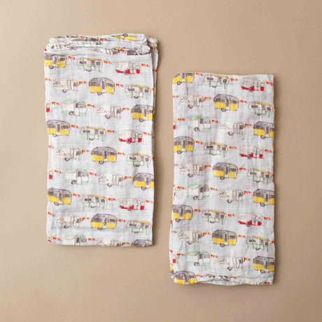 folded-burp-cloths-light-grey-with-red-and-yellow-trailer-pattern