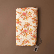 Load image into Gallery viewer, cream-with-pink-yellow-floral-pattern-folded-swaddle