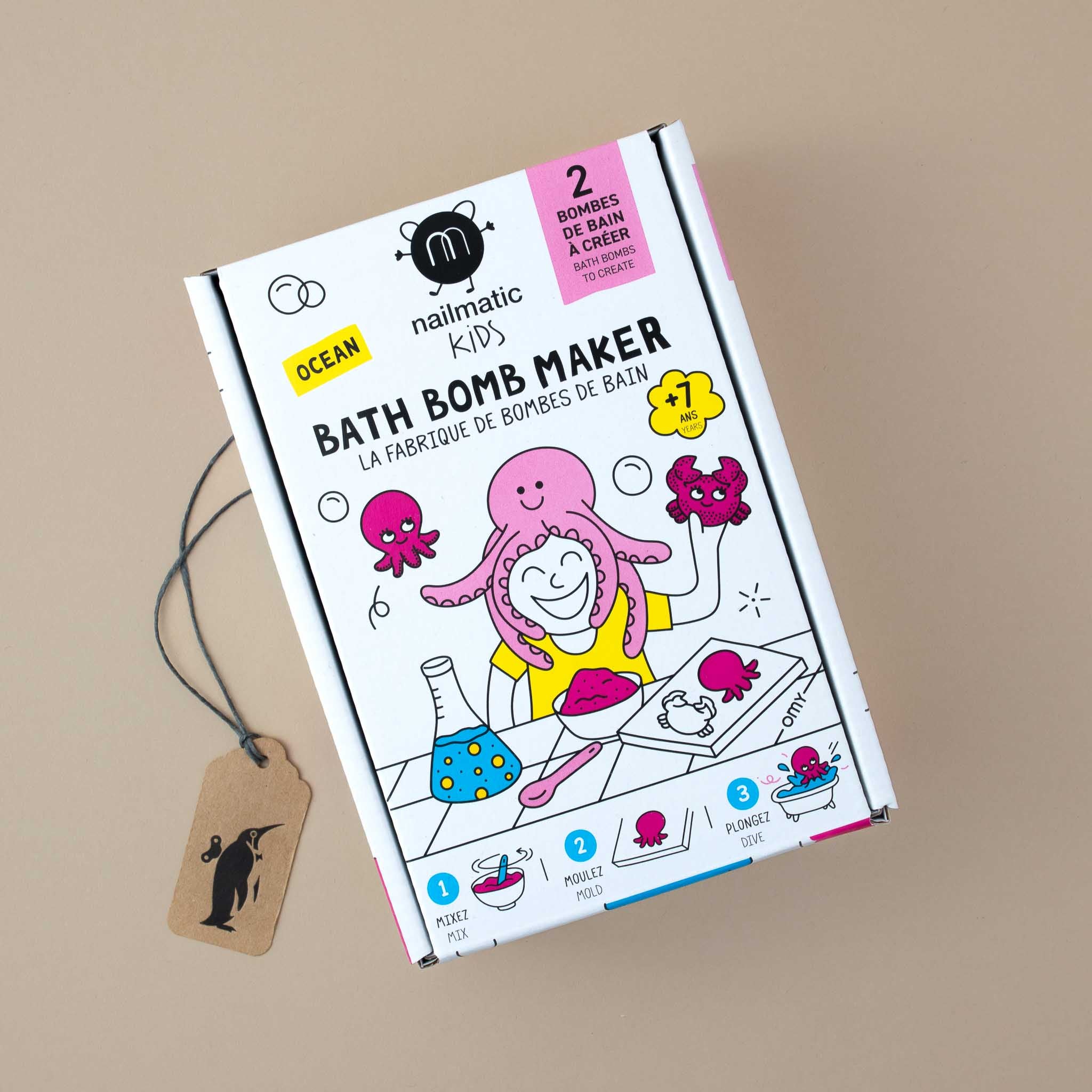 package-showing-a-child-holding-a-bath-bomb-in-crab-shape-and-an-octopus-sitting-on-its-head