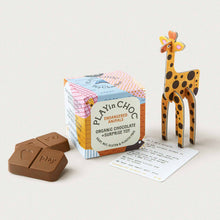 Load image into Gallery viewer, built-giraffe-toy-unwrapped-chocolates-on-display