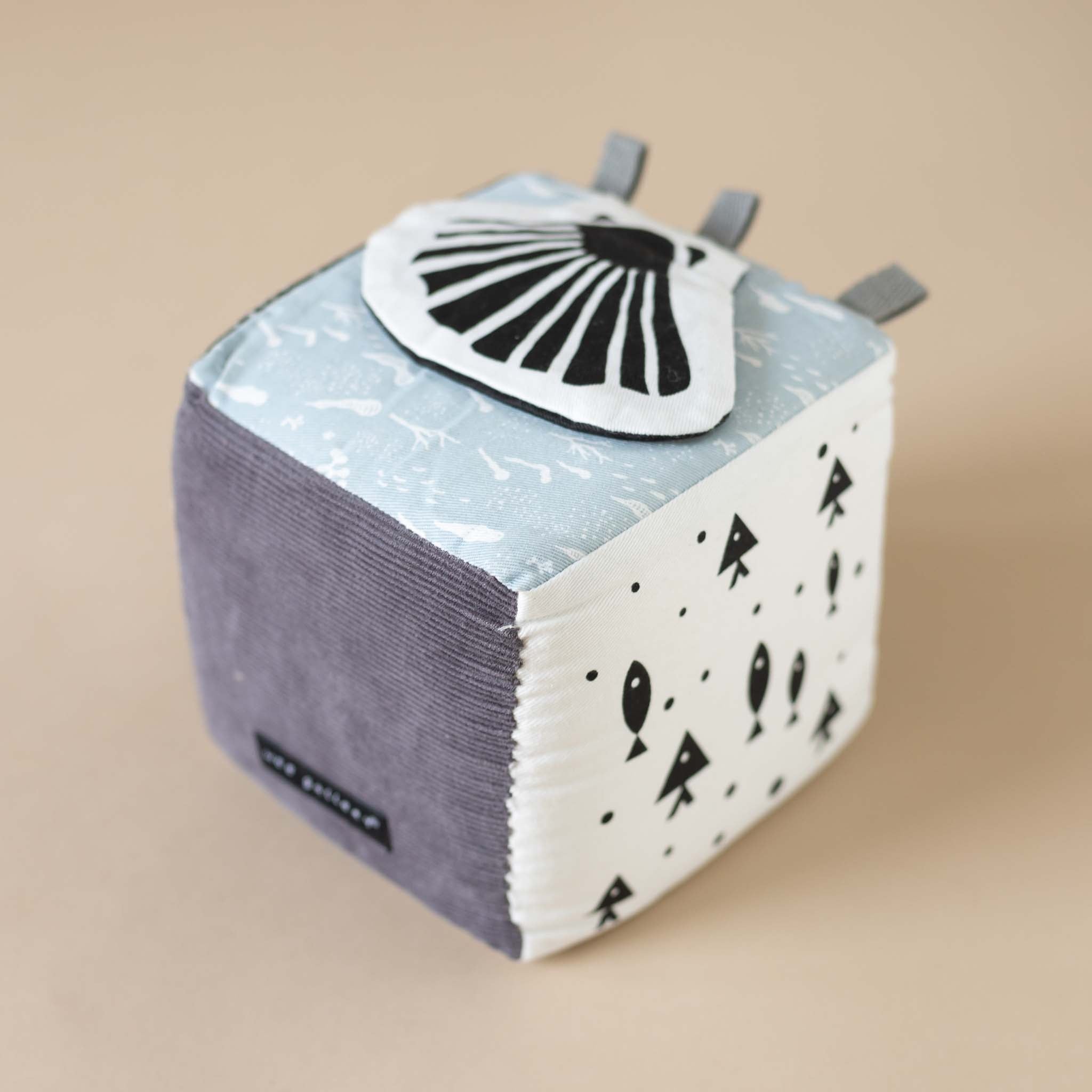 pale-blue-block-side-with-black-and-white-fabric-sea-shell