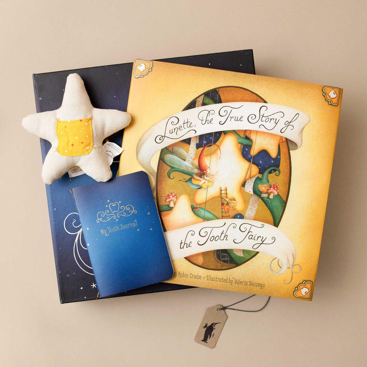 The Tooth Fairy Kit — Includes book, a star pillow with a pocket for teeth  and treasures, and a keepsake journal.