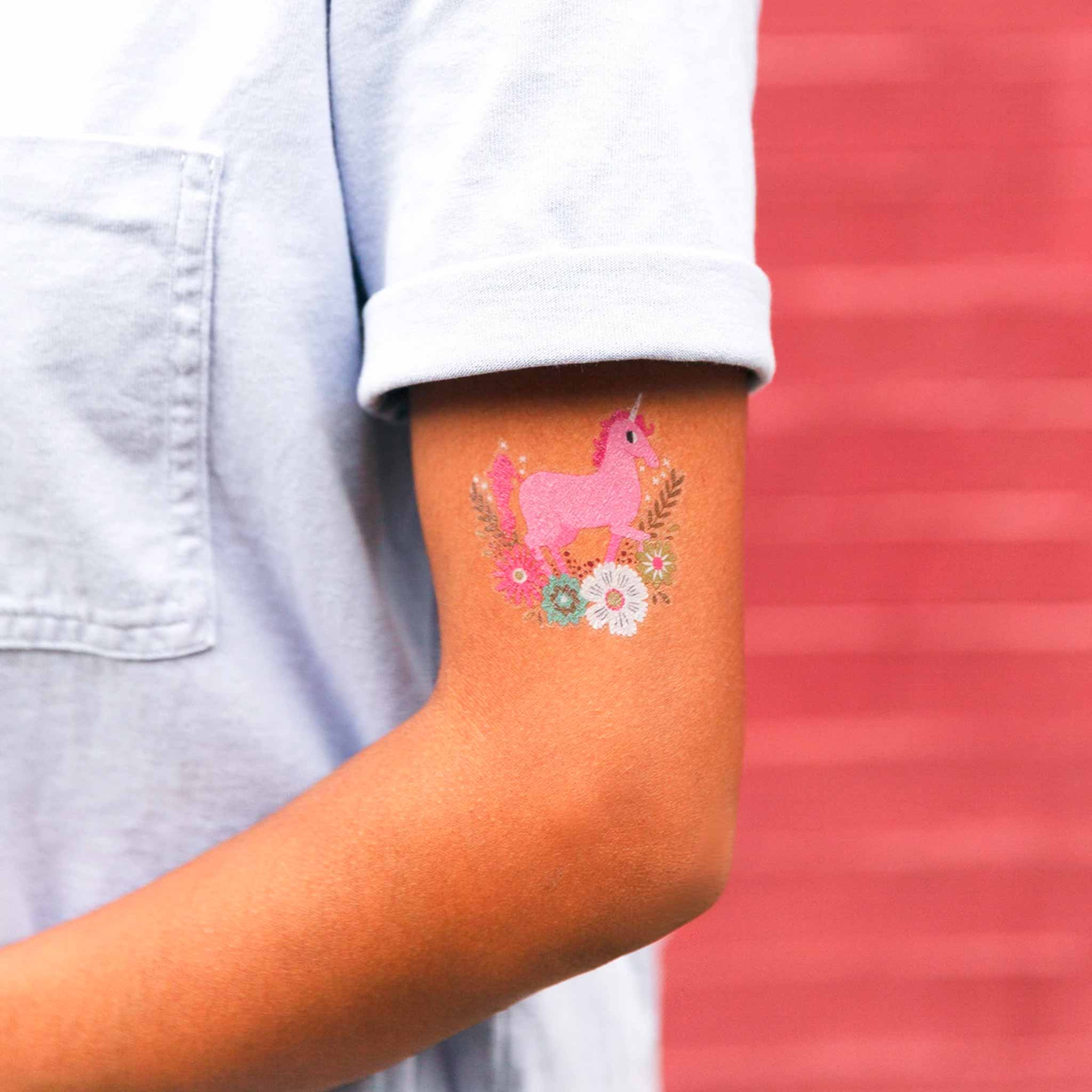 unicorn-tattoo-on-tan-skinned-model