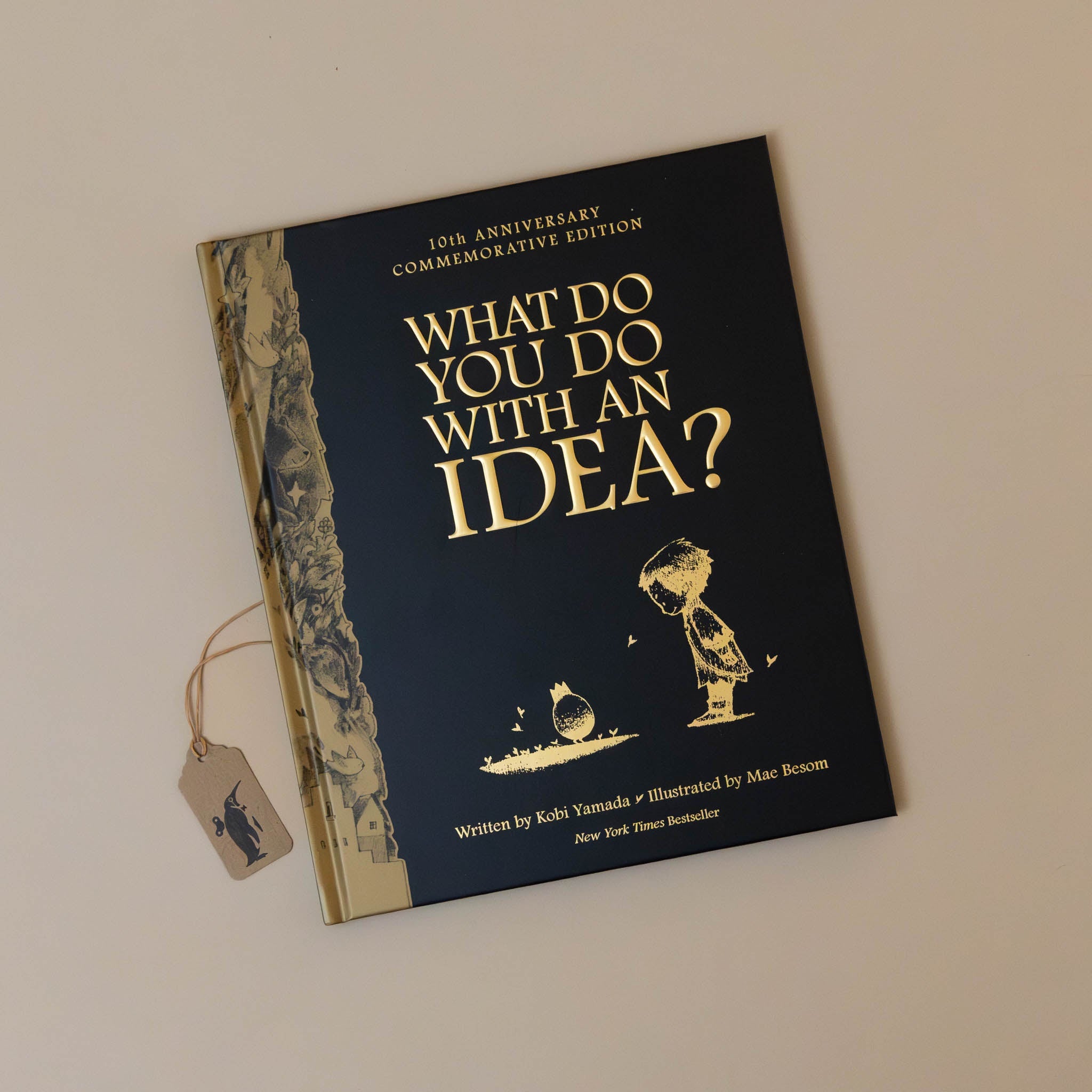 what-do-you-do-with-an-idea-book-10th-anniversary-edition-black-cover-with-gold-foil