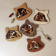 Load image into Gallery viewer, five-wooden-cats-puzzles-in-different-wood-tones