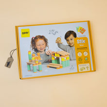 Load image into Gallery viewer, 108-piece-stix-build-and-play-set-box-with-two-children-building-a-house