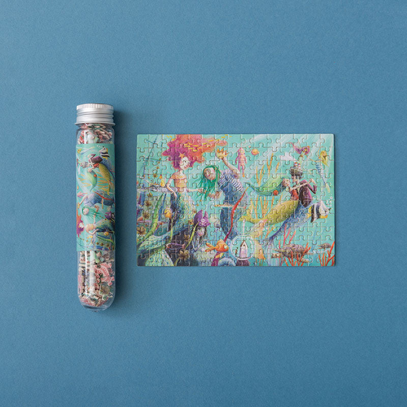 150-piece-micro-puzzle-my-mermaid Jigsaw puzzle and packaging on a blue background