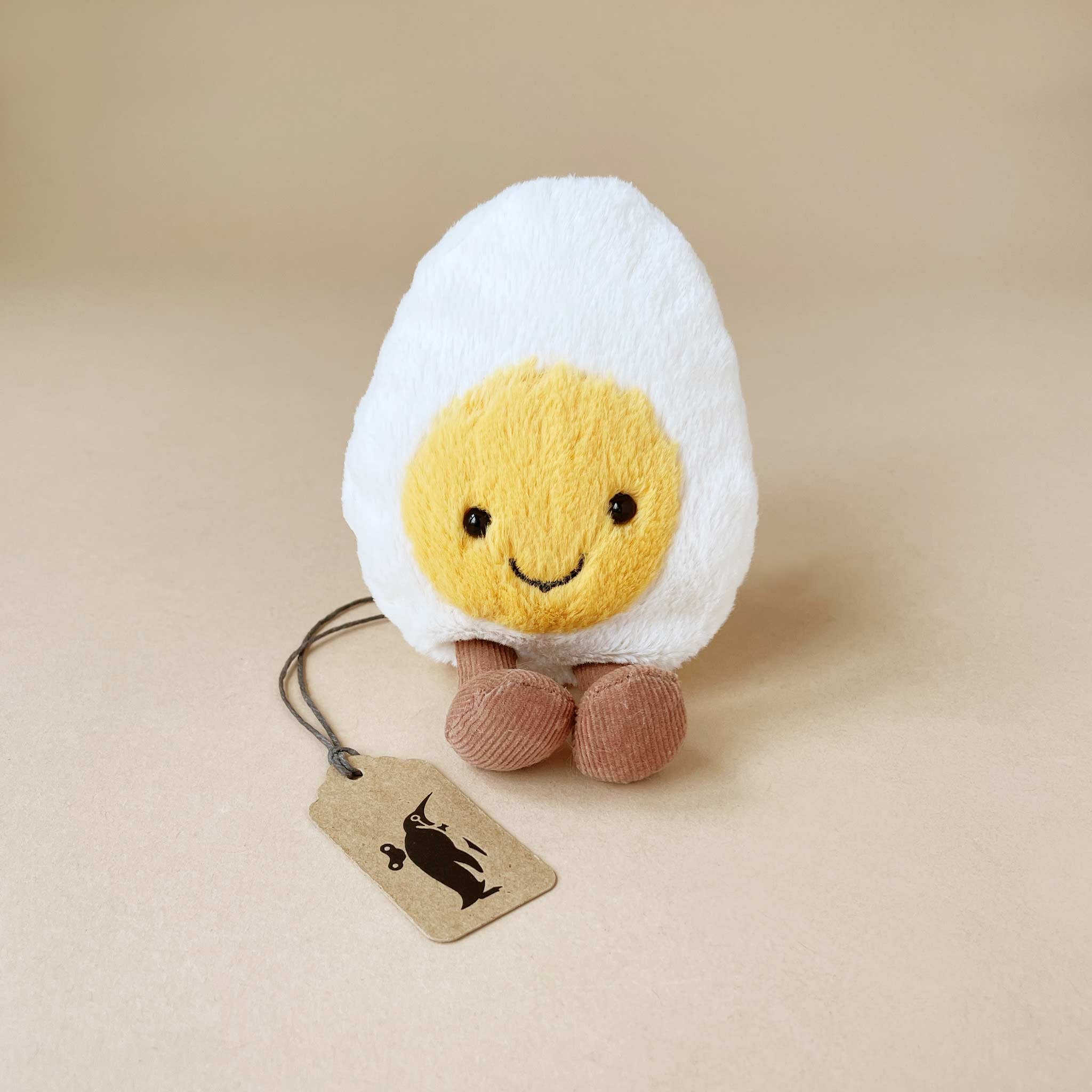 Amusesable-boiled-egg-stuffed-toy-with-yellow-center-with-outer-and-brown-corded-legs