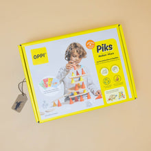 Load image into Gallery viewer, 44-piece-piks-build-and-play-set-bright-yellow-box-with-child-building