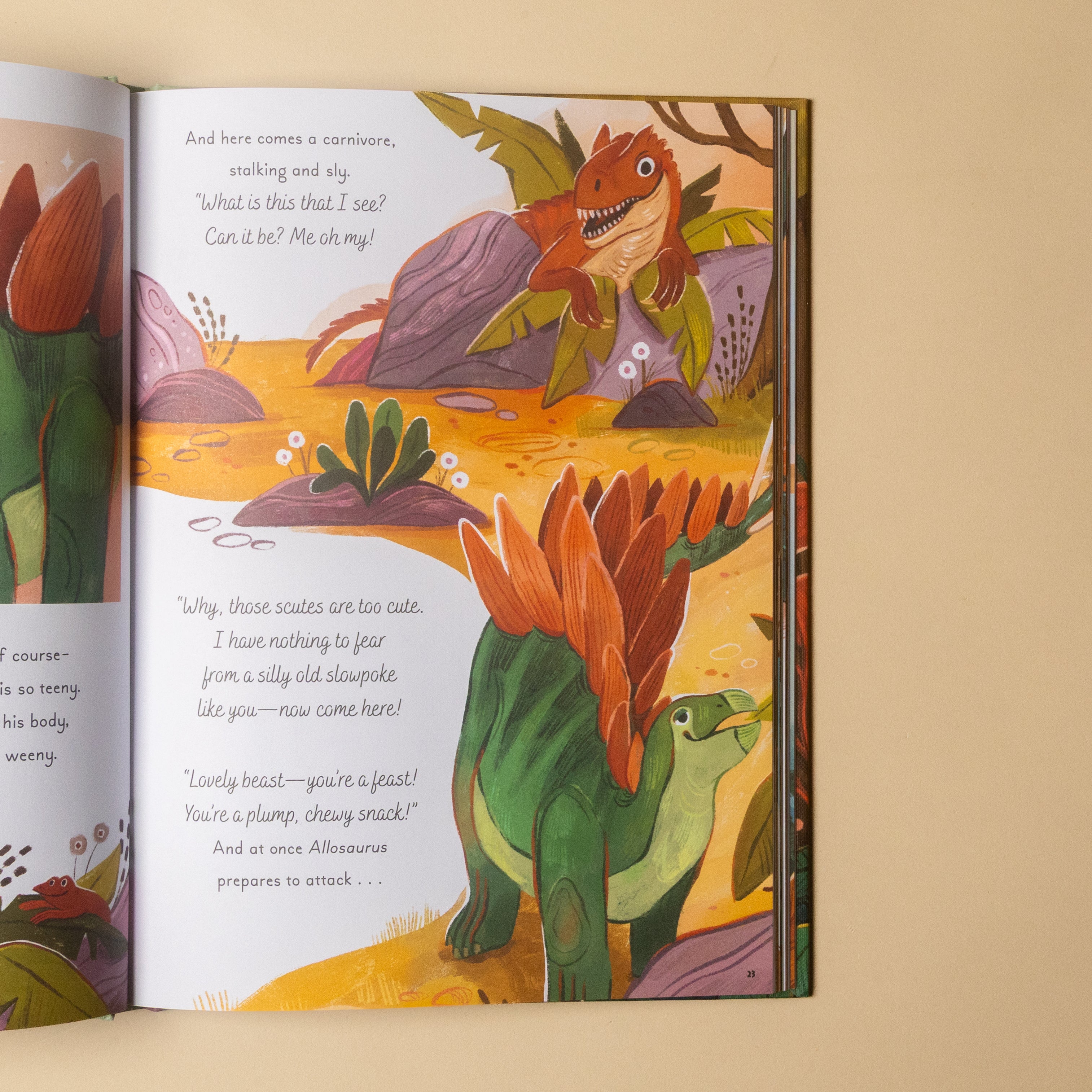 An open children's book showing a colorful illustrated dinosaur scene on two pages, photographed against a plain beige background.