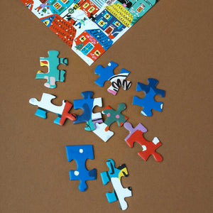 colorful-puzzle-pieces-with-houses-on-completed-puzzle