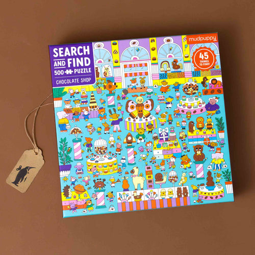 500-piece-seek-and-find-puzzle-chocolate-shop-colorful-box-with-images-of-a-large-store-with-all-kinds-of-shopper-and-sweet-treat-displays