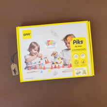 Load image into Gallery viewer, 64-piece-piks-build--play-set-bright-yellow-box-with-two-children-building