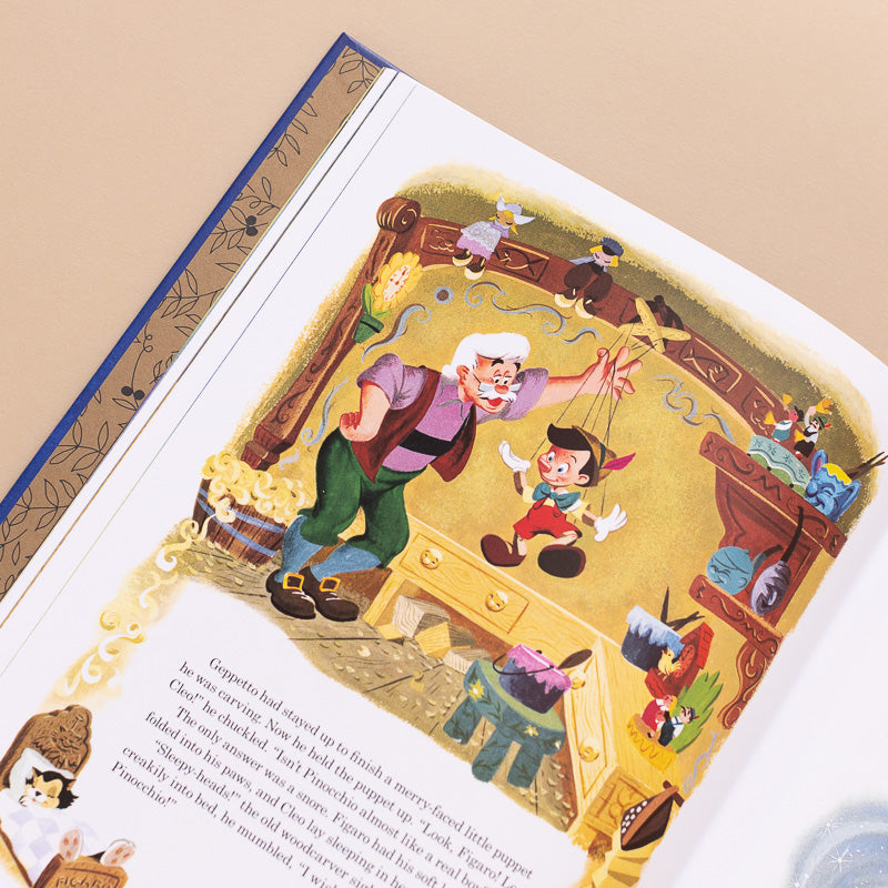Walt DISNEy children's classic book open page with pinnochio 