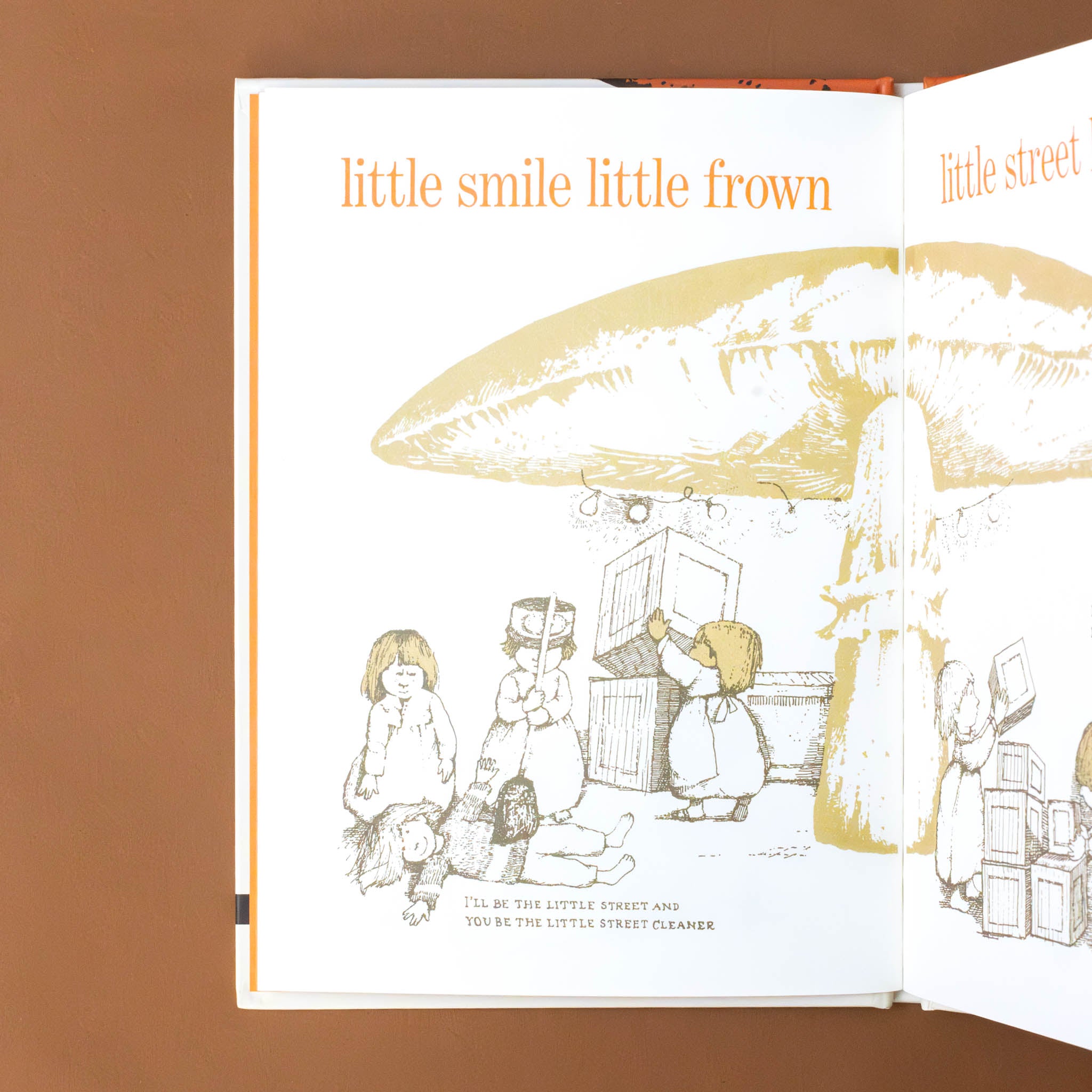 Everything-Under-a-Mushroom-Book-with-children-standing-under-a-mushroom-with-children-playing