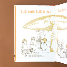 Load image into Gallery viewer, Everything-Under-a-Mushroom-Book-with-children-standing-under-a-mushroom-with-children-playing