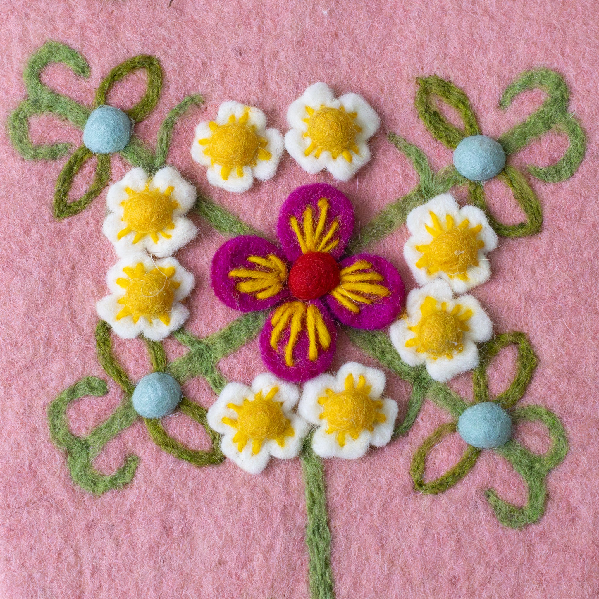 Felted-Meadow-Stocking-Blush-with-green-pink-yellow-and-blue-embroidered-detailed