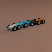 Load image into Gallery viewer, five-cars-in-green-blue-orange-natural-black-slink-down-the-track