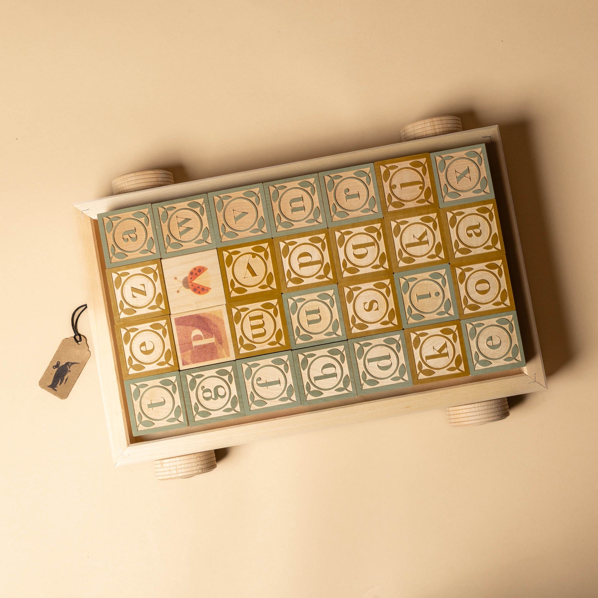Decorative Wooden Block Set | Watercolor Alphabet with alphabet blocks on a beige background