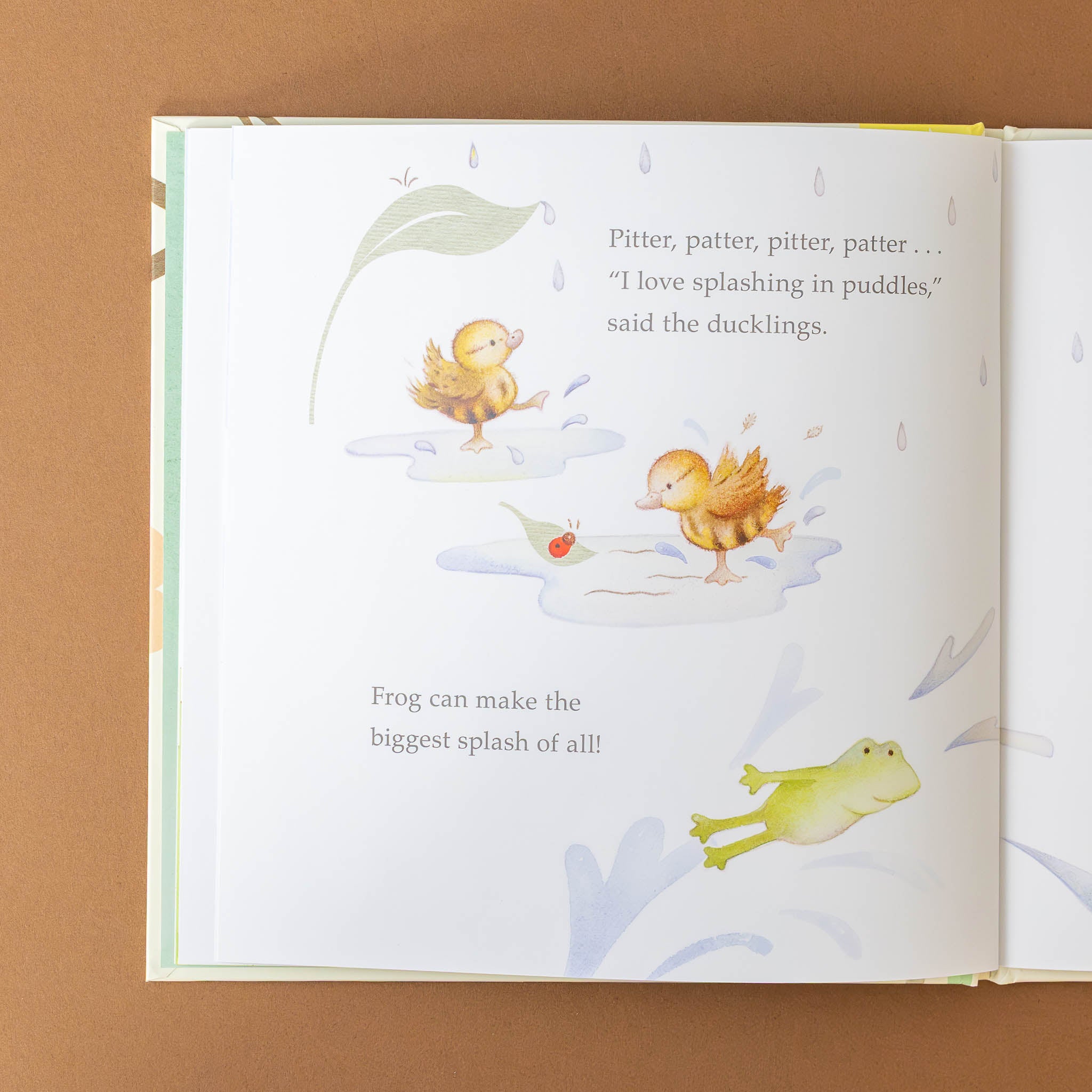 love-and-hugs-board-book-spring-duckie-and-frogs-splashing-in-puddles